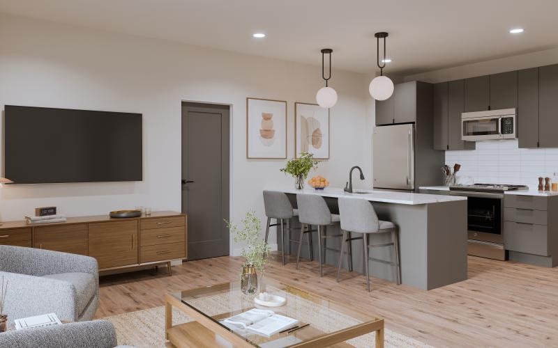 a kitchen with a tv and chairs